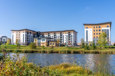 new apartments by the river in a city